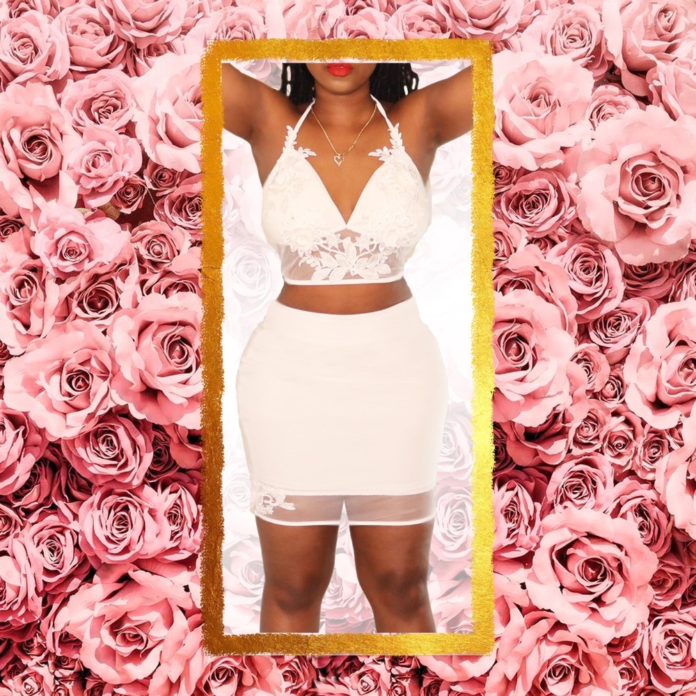 Two piece white top and skirt set